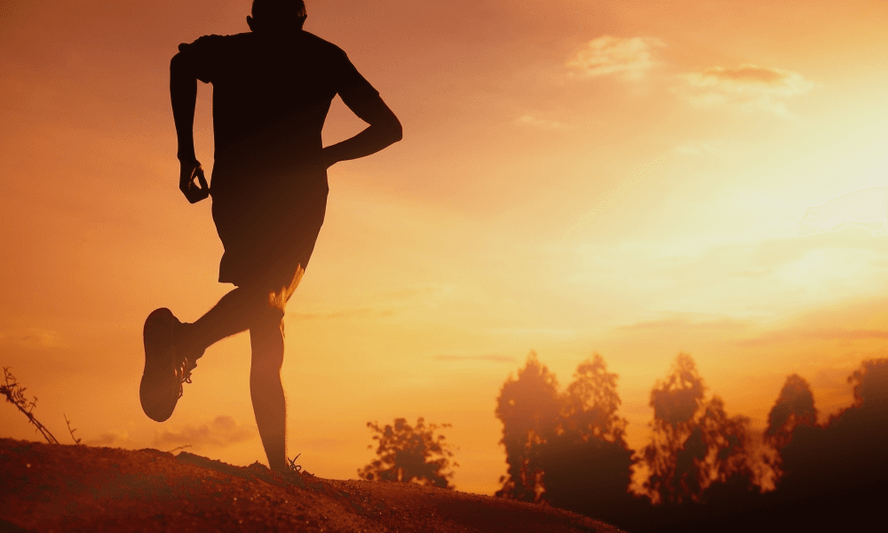 PhysiQ runner at sunset