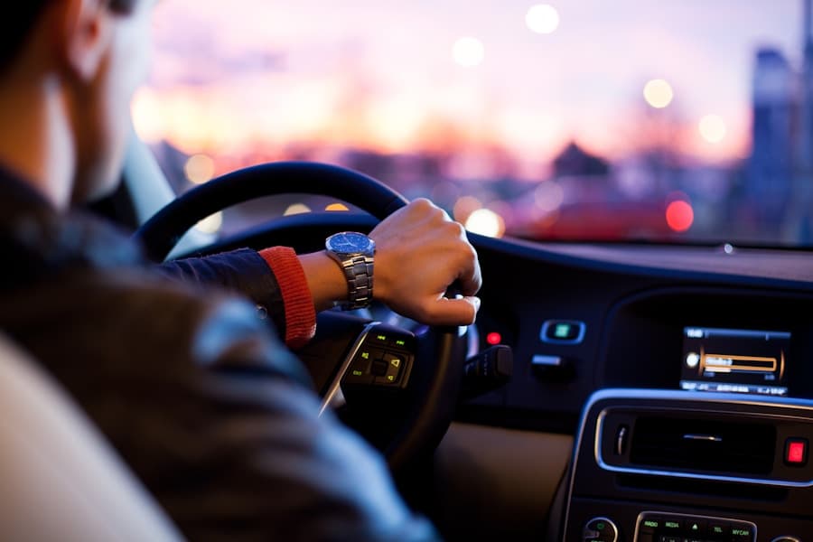 Ride hailing driver holding a steering wheel